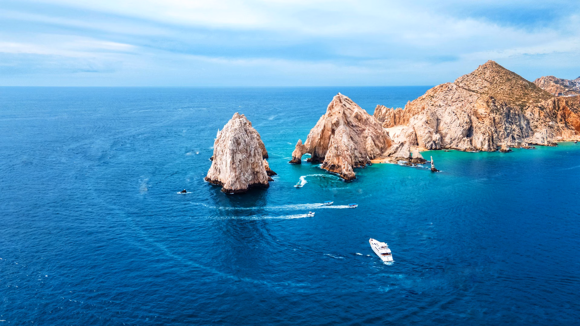 Aerial view of El Arco de Cabo San Lucas with boats and turquoise water, Punta Ballena setting, Cabo Corridor, Los Cabos